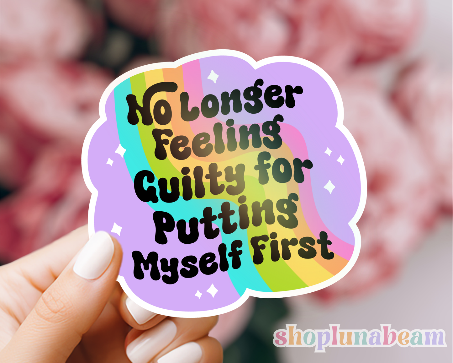 Sticker with motivational text held by a hand, brand 'shoplunabeam' visible
