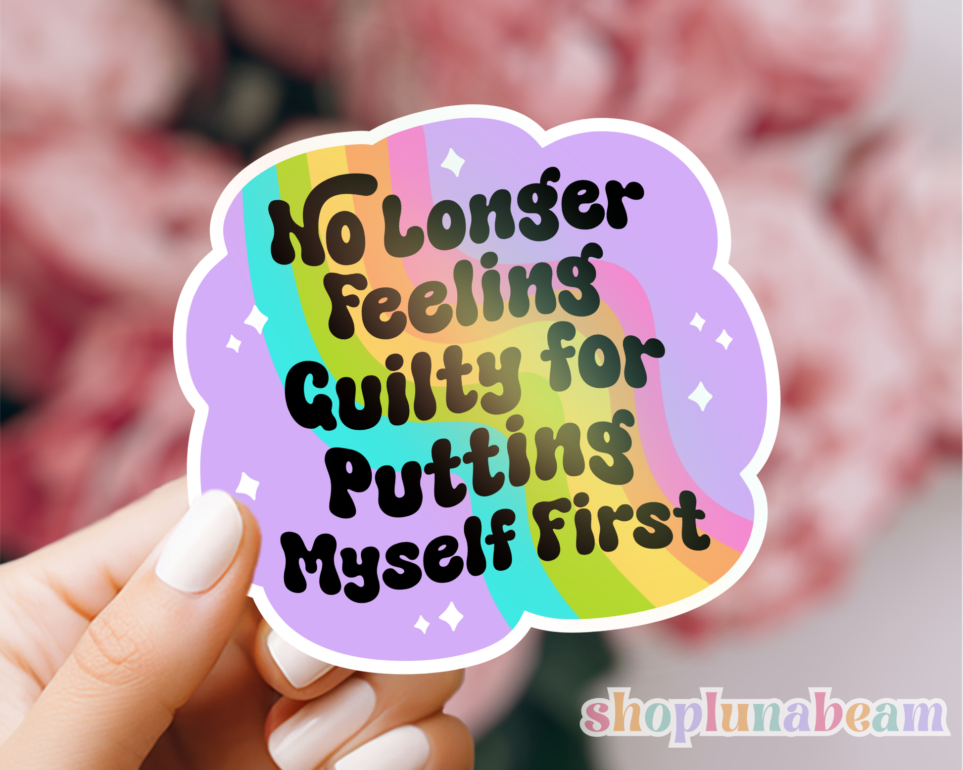 Sticker with motivational text held by a hand, brand 'shoplunabeam' visible
